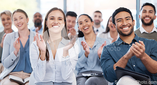 Image of Applause, happy and business people as an audience at a seminar with support or motivation. Smile, team and employees clapping hands for success, agreement or celebration at a workshop or conference