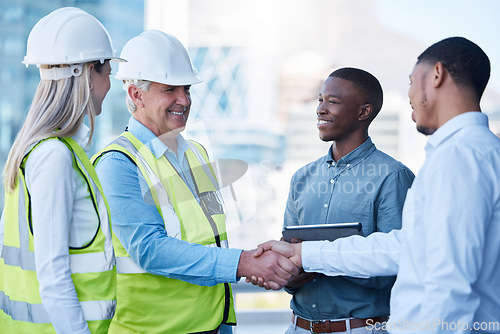 Image of Building deal, happy and people with handshake on site for construction job, logistics and meeting. B2b, support and engineers shaking hands with a black man for a maintenance or inspection contract