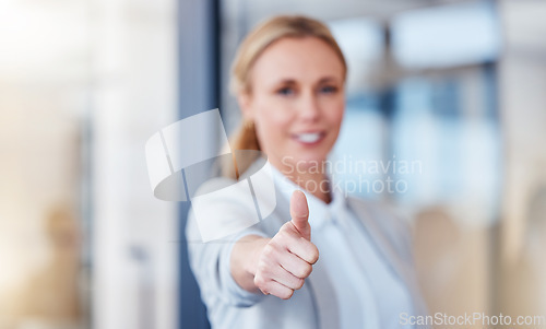 Image of Business woman, hand and thumbs up for winning, success or thank you and good job at office. Happy female person, CEO or employee showing thumb emoji, yes sign or like for win, goals or motivation