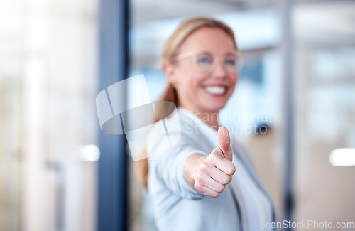 Image of Business woman, hand and thumbs up for success, winning or thank you and good job at office. Happy female person, CEO or employee showing thumb emoji, yes sign or like for win, goals or motivation