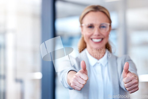 Image of Business woman, hands and thumbs up for success, winning or thank you and good job at the office. Happy female person, CEO or employee with thumb emoji, yes sign or like for win, goals or motivation