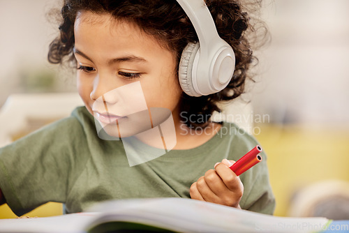 Image of Music, headphones and relax with child and art for learning, education and writing. Learning, streaming and drawing with young boy student and notebook at home for audio, creative and kindergarten