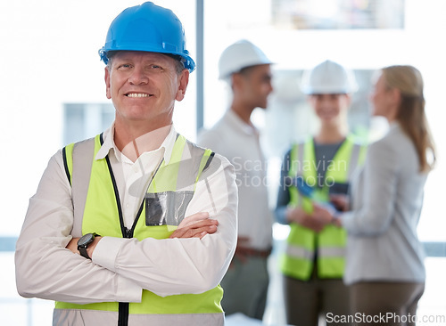 Image of Architecture, man portrait and arms crossed for planning, team leadership or project management. Engineering, construction and happy face of senior person, contractor or manager with career mindset