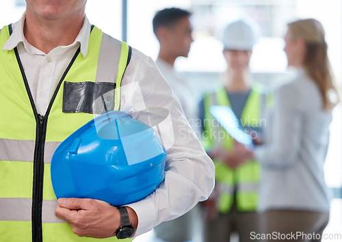 Image of Helmet, engineering and man or construction worker in office meeting, planning and project management for building. Architecture, hands zoom and safety gear of contractor people, builder and industry