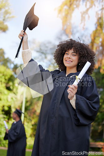 Image of Graduation, success and woman student or graduate celebrate an achievement on university or college campus. Happy, happiness and person with a certificate, scholarship or diploma from education event