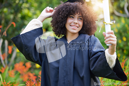 Image of Graduation, achievement and woman student or graduate celebrate success on university or college campus. Happy, happiness and person with a certificate, scholarship or diploma from education event