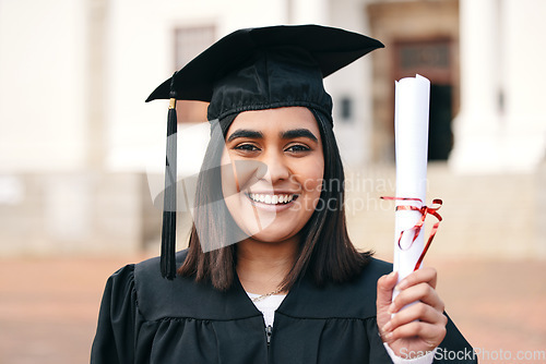 Image of Diploma, certificate and portrait of a woman graduate with success or achievement on college or university campus. Graduation, happy and young person or student with an education scholarship