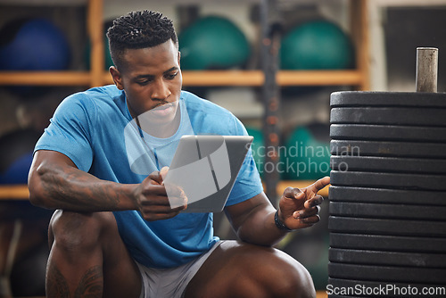 Image of Gym inspection, exercise equipment and man with tablet,.weights for muscle training and personal trainer. Check, admin with tech gadget and African male manager at fitness studio doing inventory