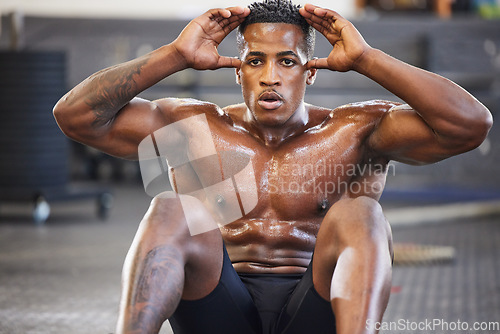 Image of Black man in gym, sweating from sit ups for fitness and abs, exercise routine with muscle and focus. Health, active and determined with core workout, strong male person with sports and training