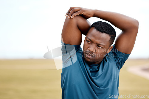 Image of Stretching, fitness and black man in park for exercise, training and cardio workout outdoors. Sports, motivation and male person stretch arms to warm up for healthy body, wellness and performance