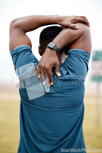 Image of Stretching, exercise and back of black man in park for fitness, marathon training and running. Sports, nature and male person stretch arms for warm up, cardio workout and exercising for wellness