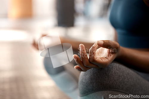 Image of Woman, hands and yoga in meditation for zen, spiritual wellness or peaceful exercise and workout in gym. Hand of female person yogi in calm meditating, training or exercising for mind, body or spirit