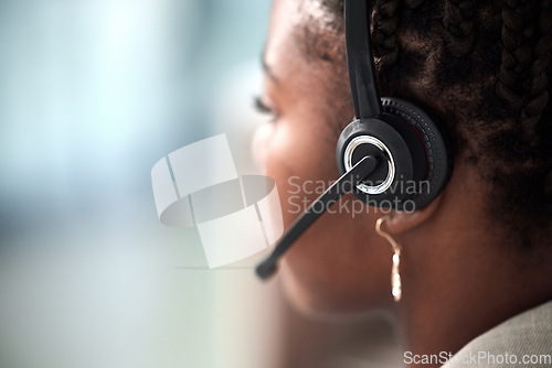 Image of Call center, microphone and closeup of black woman in office for customer service, contact us or consulting. Receptionist, crm and business with employee for telemarketing, help desk or communication