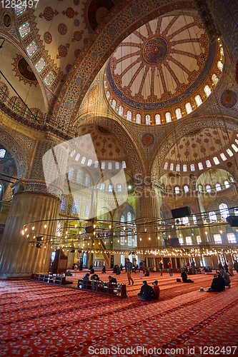 Image of Istanbul, Turkey - 1 April, 2017: Interior of blue Mosque also called Sultan Ahmed Mosque or Sultan Ahmet Mosque in Istanbul, Turkey.Ceiling decorations with Islamic elements of Sultan Ahmed Mosque do