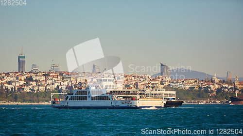 Image of Istanbul, Turkey - 1 April, 2017: Passenger ship crossing Bosporus