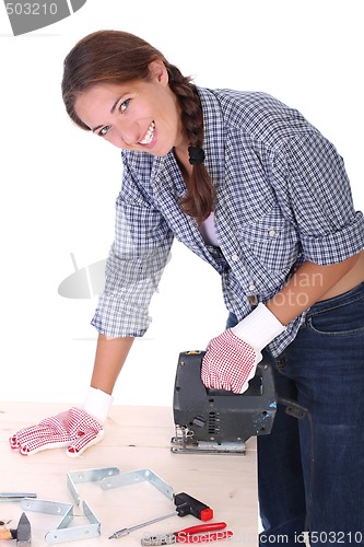 Image of woman carpenter at work