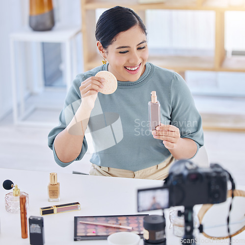 Image of Makeup, influencer, camera and happy woman streaming tutorial for cosmetics, social media or skincare. Foundation, live stream and content creator with smile, product broadcast and beauty channel