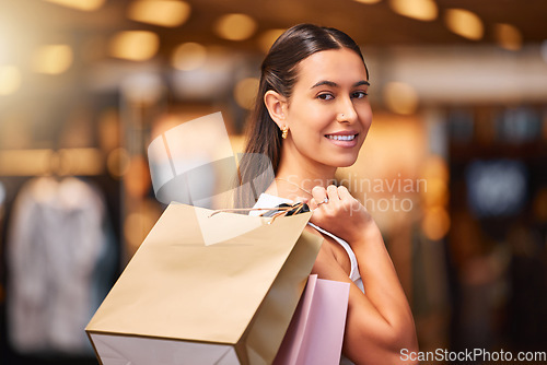 Image of Shopping bag, mall and fashion portrait of a woman with sale product or discount deal. Female person or happy customer with retail bags for luxury store promotion, commercial offer and commerce