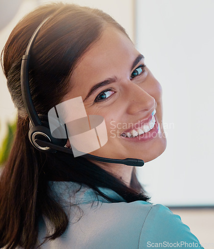 Image of Call center, portrait and happy woman in office for customer service, telemarketing or support. Face, smile and female sales agent, consultant or employee from Canada working, consulting and business