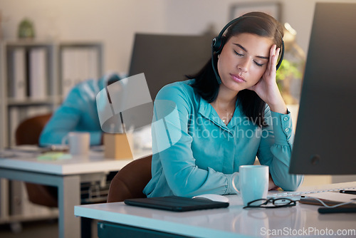 Image of Call center, sleeping and tired woman in office for customer service or support at night. Telemarketing, sleep and fatigue of female sales agent, consultant burnout and employee stress for deadline