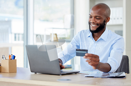 Image of Business, payment and black man with a credit card, laptop and connection with accounting. Male person, customer and employee with a pc, technology and transaction with consumer and online shopping