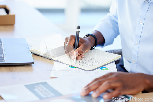 Image of Accountant, closeup and black man with a calculator, writing and notebook with a budget, documents or planning. Male person, investor or employee with paperwork, research or check list in a workplace