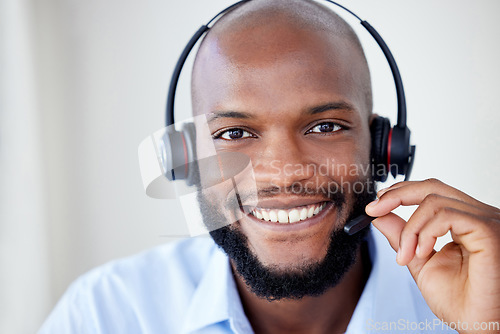 Image of Microphone, call center and smile on face of black man agent for telemarketing, salesman or help desk. Portrait of african consultant person with headset for sales, customer service or crm support