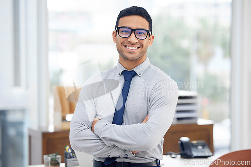 Image of Portrait, office and business man with arms crossed in legal career, law firm and professional mindset. Happy worker, lawyer or face of young person with confidence, management and smile for career