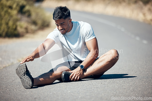 Image of Happy man, fitness and stretching body on road for running, cardio workout or exercise outdoors. Fit, active or sporty male person, athlete or runner in warm up leg stretch for training on street