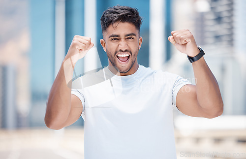 Image of Happy man, fitness and fist in city for winning, celebration or achievement in the outdoors. Excited male person, athlete or runner in joyful happiness for workout success or exercise in a urban town