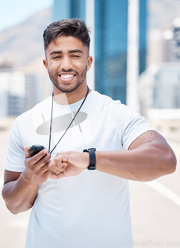 Image of Fitness, smart watch and portrait of man in city for time for running, exercise and heart rate workout. Wellness, sports and male person check wristband for marathon training, monitor and performance