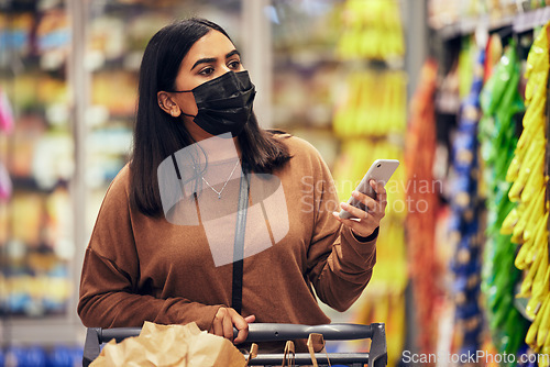 Image of Woman, phone and grocery checklist in shopping for food, luxury or product with face mask at supermarket. Female person or customer with mobile smartphone app for ingredient or groceries at store