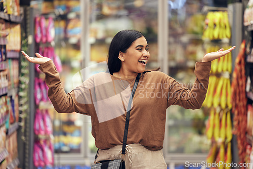 Image of Excited, grocery and shopping with woman in supermarket for sale, product deal and food. Choice, offer and happy with female customer in groceries store for retail promotion, health and discount