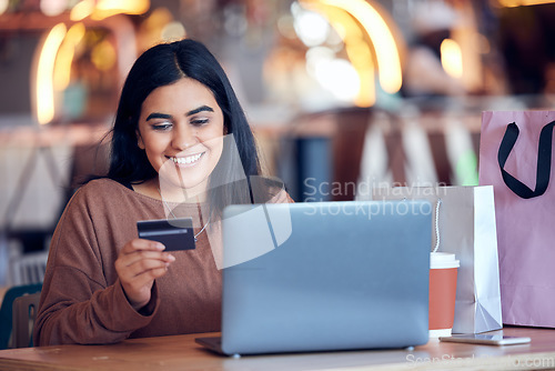 Image of Online shopping, woman and credit card with freelance worker on a ecommerce website. Person, cafe and freelancer at a laptop on a digital store app for deal and discount with payment at table