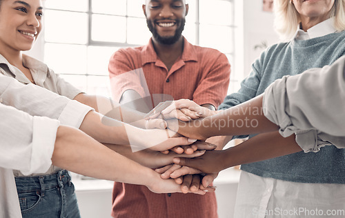 Image of Teamwork, hand stack and happy business people together with strategy, support and collaboration at start up. Coworking team, hands in huddle and employees working with cooperation in modern office.