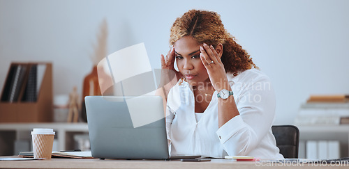 Image of Stress, angry and woman with a startup fail, headache and sad in a company office desk working on a laptop. Frustrated, burnout and young entrepreneur thinking of a risk or problem, tired and mistake