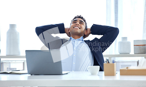 Image of Relax, business and man with a smile, laptop and good deal in an office, calm and stretching. Male person, consultant and agent in a workplace, rest and peace with sales, connection and finished task