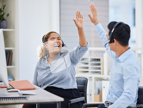 Image of Call center, man and woman with high five, motivation and teamwork in office, telemarketing and success. Young consultant team, celebration and customer service with happiness, excited and target