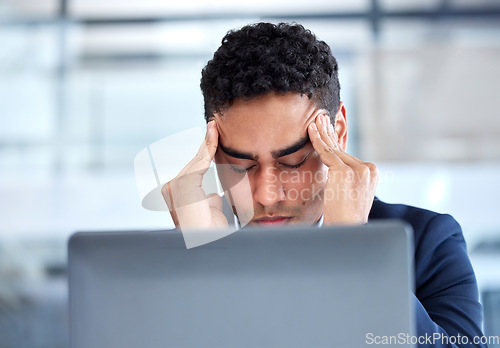 Image of Business, stress and man with a headache, laptop and consultant overworked, deadline and frustrated. Male person, employee and agent with a migraine, pc and technology with burnout and health issue