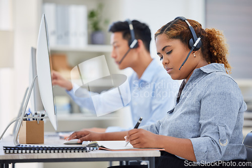 Image of Telemarketing, business woman document and contact us writing in a office with paperwork at desk. Call center, African female employee and consulting of a worker with web support and agent notes