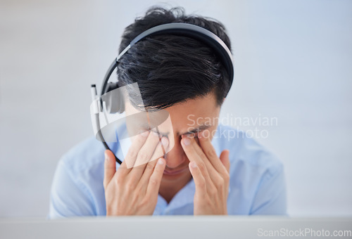 Image of Business man, telemarketing and headache with eye strain from computer 404 and consulting fail. Call center, contact us and male worker feeling tired from work deadline and consultation problem