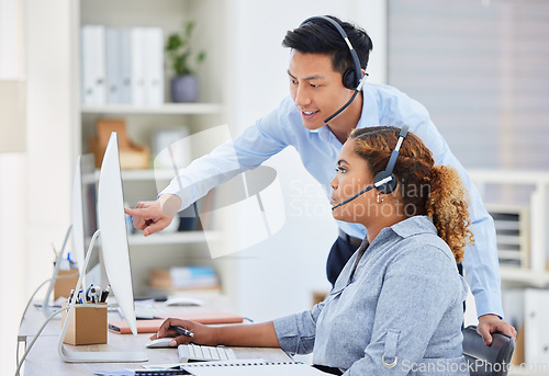 Image of Call center, training and manager with woman on computer for help, advice and assistance. Telemarketing, customer support and female intern with Asian man boss for contact, crm service and consulting