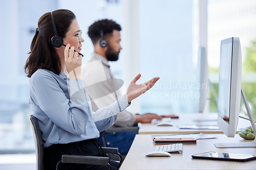 Image of Angry, call center and woman with customer service problem and confused by client at an agency office. Glitch, frustrated and agent or consultant with stress talking on a video call online