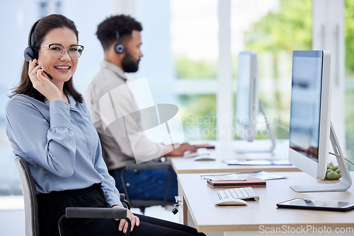 Image of Happy woman, call center and portrait smile in customer service, support or telemarketing at the office. Friendly female person consultant, agent or virtual assistant in contact us at the workplace