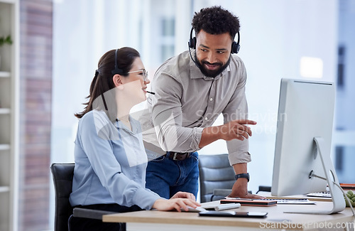 Image of Call center, manager and woman with telemarketing, help and advice with conversation, explain system and computer. Happy man, supervisor and agent in a workplace, customer service and tech support