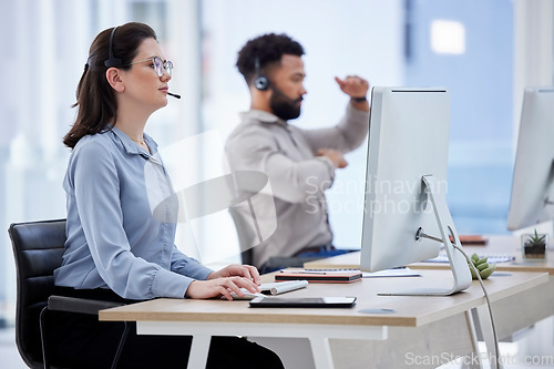 Image of Call center, customer support and woman on computer in office for hotline, advice and online help. Coworking, telemarketing and female worker with headset for contact, crm support and consulting