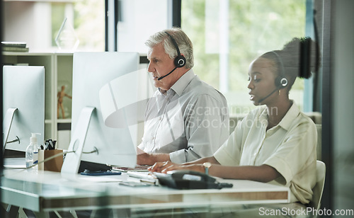 Image of Business people, call center and phone consultation of staff with web support and customer service. Telemarketing, office and diversity of workforce with online contact us help and conversation