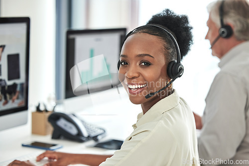 Image of Black woman, call center and portrait with consultation and smile in a office with contact us work. Telemarketing, consulting job and African female employee with computer and customer service