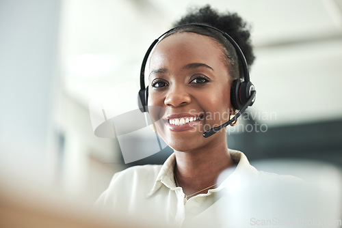 Image of Black woman, call center portrait and phone consultation with a smile in a office with work. Telemarketing, consulting job and African female employee at a contact us and customer service company