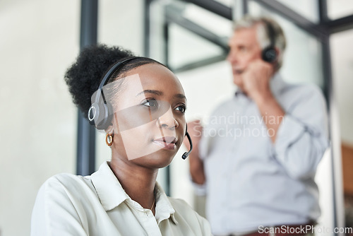 Image of Business woman, call center and telemarketing work of a web support worker with consulting in office. Contact us, African female employee and phone consultation in a office with workforce team